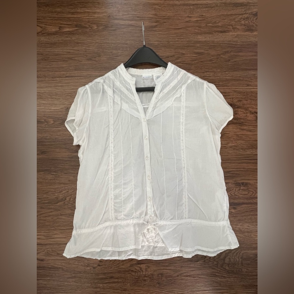 White sheer button down blouse with tiny sequins, lace trim and bow tie